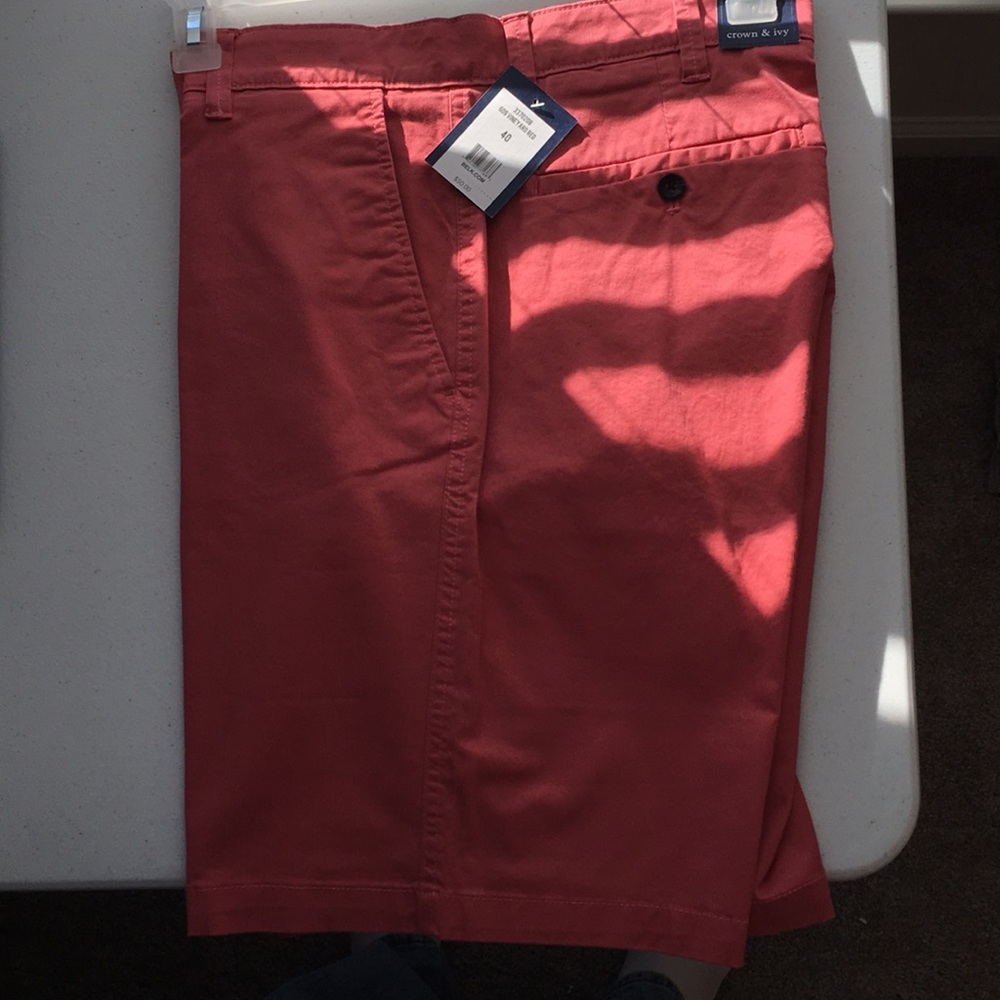 One pair of men’s shorts color is vineyard red.